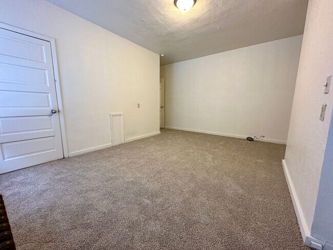 Building Photo - Super Spacious Three Bedroom on Bates Street! Deck & Patio! Washer & Dryer Included! Call Today!