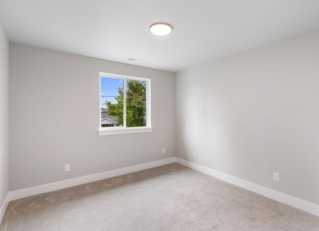 Building Photo - Beautiful New Construction 4-Bedroom Home with a Main-Level Bedroom, Designer Finishes, Attached ...
