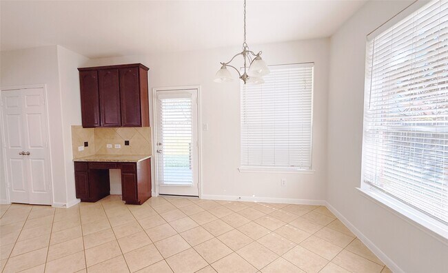 Building Photo - 8610 Rising Oak Ln