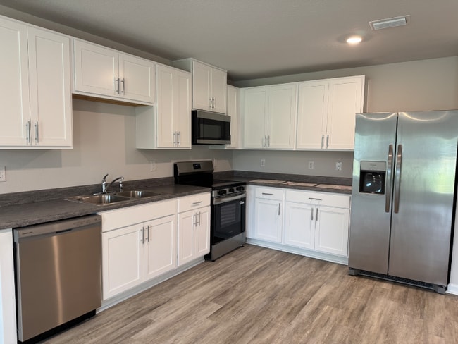 Building Photo - 6365 Firefly Dr