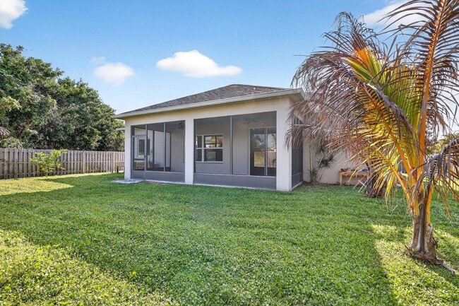Building Photo - Modern 4-Bedroom Rental with Screened Patio & 2-Car Garage