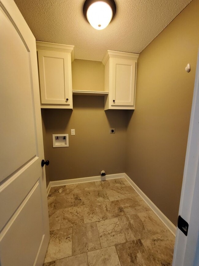 Building Photo - Spacious 4-Bedroom Home with Open Layout, Granite Finishes & Fenced Yard