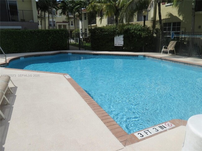 Building Photo - Northeast 8th Avenue, Miami Shores, FL 33138 - 2 BR 2 BA townhouse