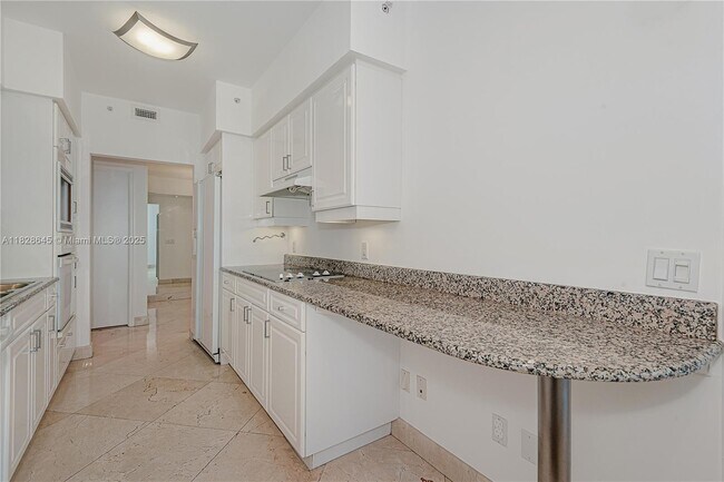 Building Photo - 4779 Collins Ave