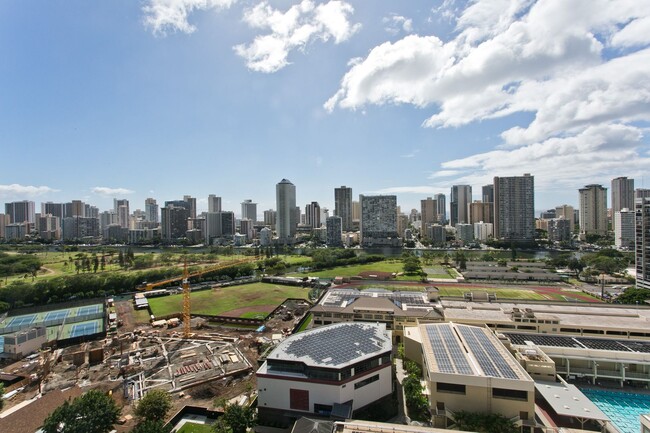 Building Photo - Royal Iolani Corner Unit - 2 PRK w/ ALL Ut...