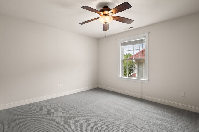 Building Photo - Five-Bedroom Tudor Home with Main-Level Primary Suite in Albemarle Reserve