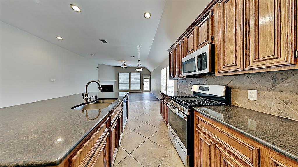 KITCHEN, OPEN TO LIVING ROOM - 5623 Wagon Wheel Ln