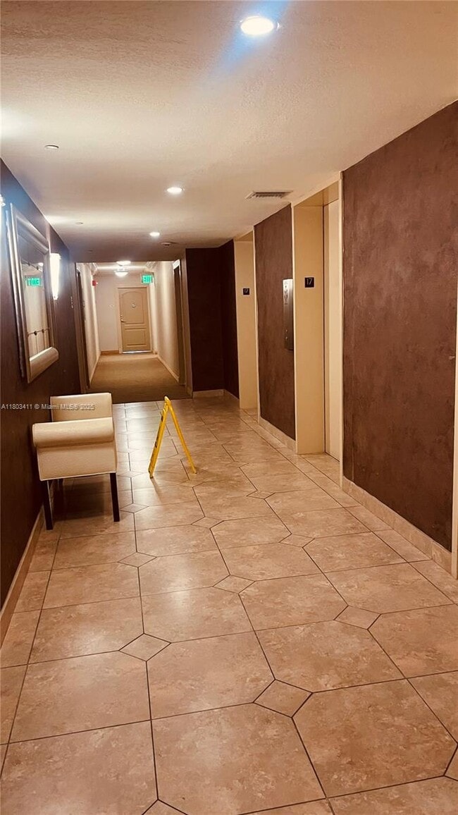 Building Photo - 3675 N Country Club Dr