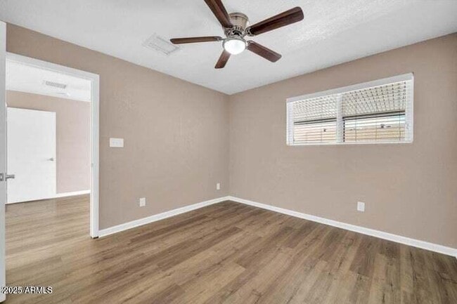 Building Photo - 9639 W Cinnabar Ave