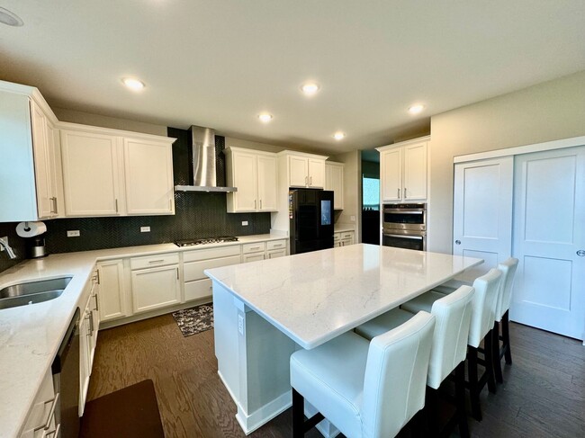 Building Photo - Newly Built 5-bedroom featuring luxe finishes and a spa-inspired master suite.
