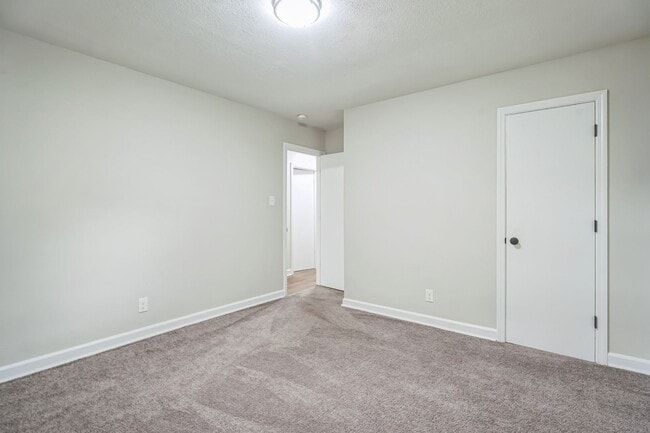 Building Photo - 4BR Brick Ranch with Upgrades & Room to Feel at Home!