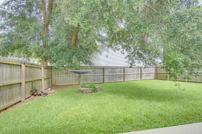 Building Photo - Spacious Cottage-Style Home Near UWF, Navy Federal & West Florida Hospital with Private Upstairs ...