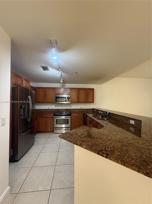 Building Photo - 8390 SW 72nd Ave