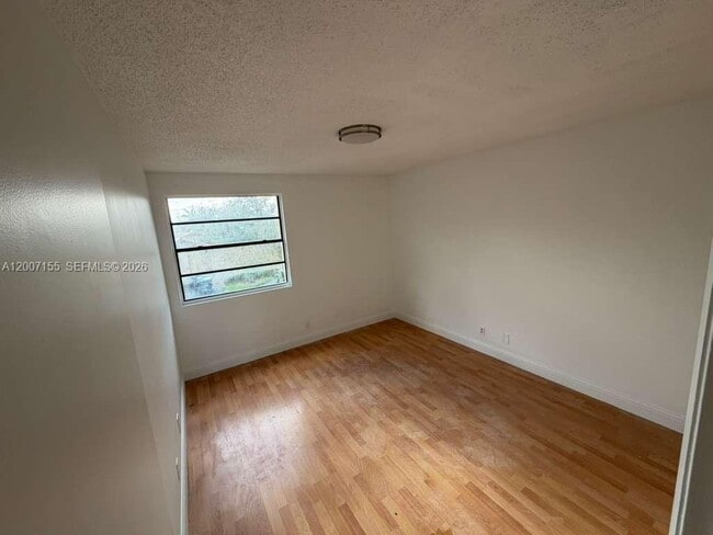 Building Photo - 17317 NW 63rd Ave