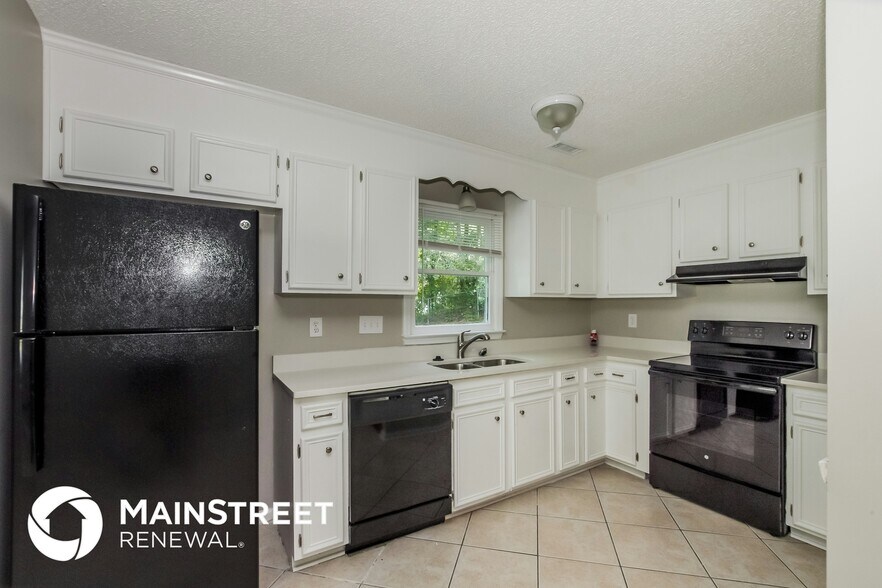 Building Photo - 7100 Cabe Ln