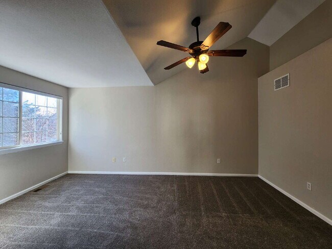 Building Photo - Spacious Two-Suite Townhome With Garage, Fireplace And Community Pool