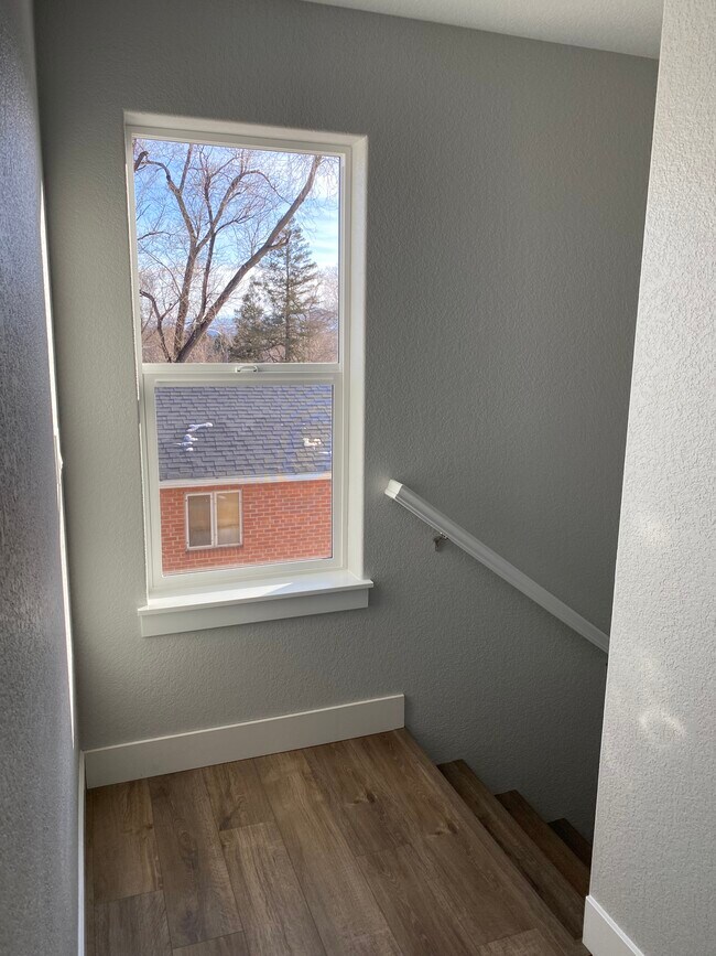 Window at Top of Stairs - 1130 Swope Ave