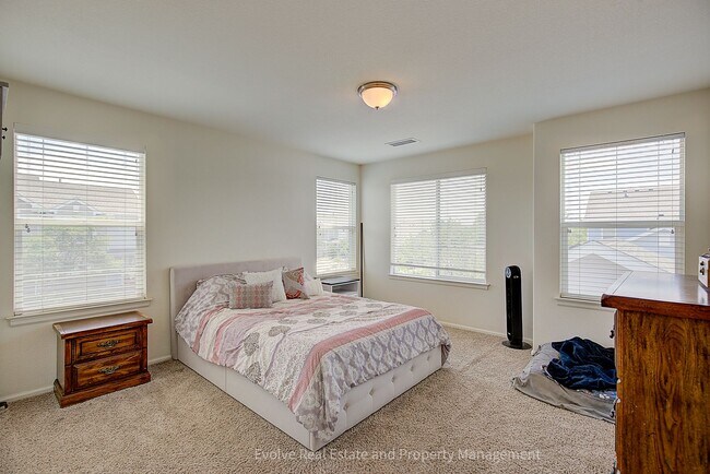 Building Photo - Evolve Real Estate: Beautiful Corner Townhome Available for Move-in on July 21st!