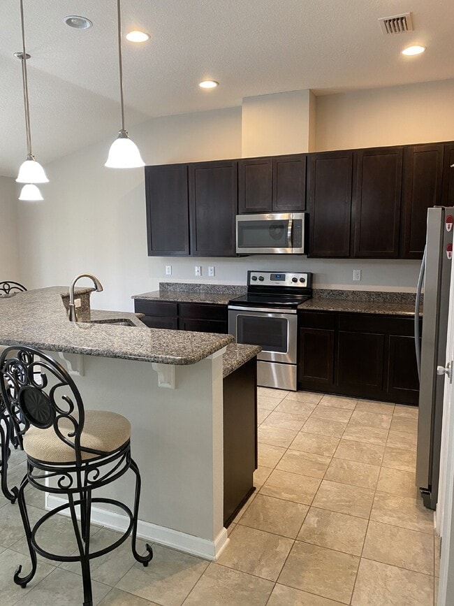 Building Photo - Elegant 4BR Home with Gourmet Kitchen, Smart Tech Package & Nature Views - Coming Soon