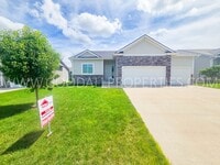 Building Photo - Summer Special! 4-Bedroom Ranch Home with Finished Basement & 3-Car Garage