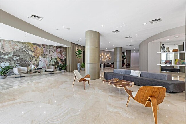 Building Photo - 10275 Collins Ave