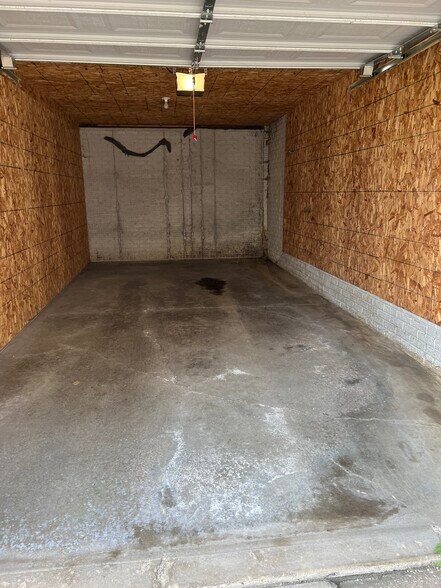 Large garage with extra storage. - 643 E 46th St