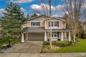 Building Photo - Spacious 5-Bedroom Home with Backyard Oasi...
