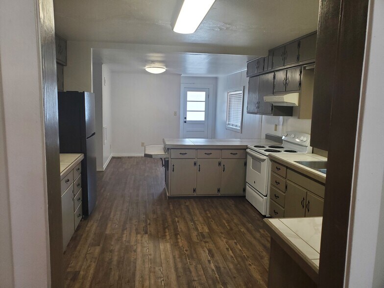 Kitchen is LVP flooring - good stuff. - 358 E Lincoln Rd