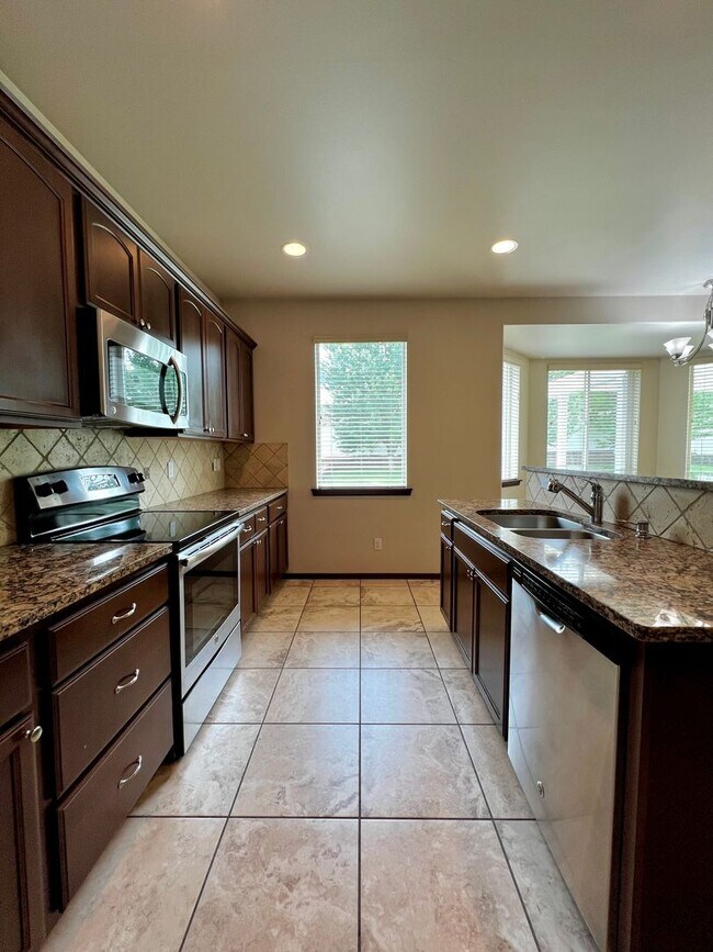 Building Photo - Home in West Valley with garage & back yard!