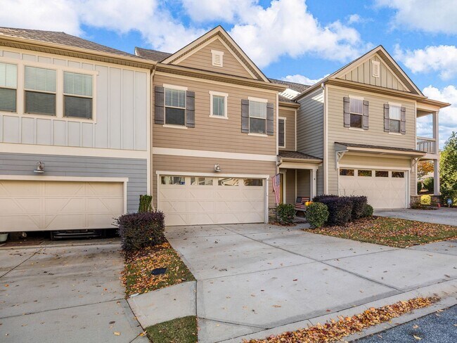 Building Photo - **MOVE IN SPECIAL! 50% off first month's rent!!** Spacious 4BR Townhouse with 2-Car Garage Near D...