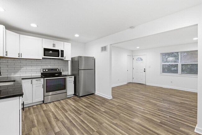 Building Photo - Everything upgraded on this 4 bedroom — top-notch finishes throughout!