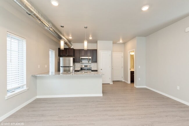 Building Photo - Villas at The Hub | Modern 3 Bedroom Townhome Garage & Private Entry