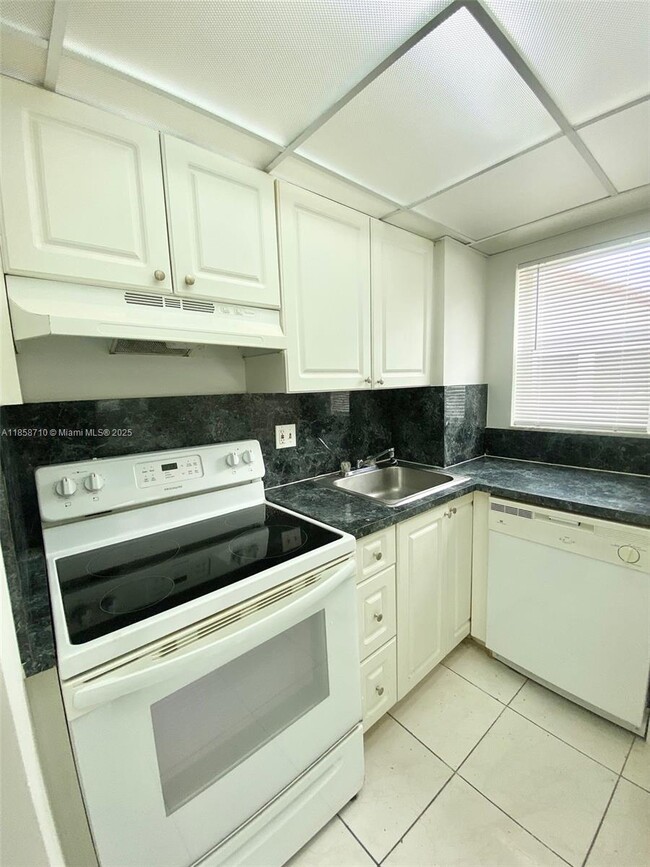 Building Photo - 3200 Coral Springs Dr