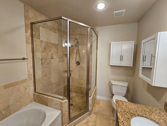 Building Photo - 2-bedroom, 2-bath condo in Gated community...
