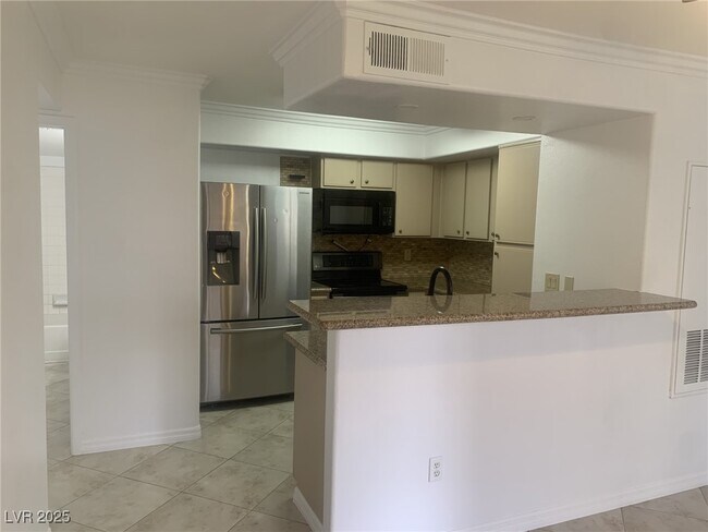 Building Photo - 2300 E Silverado Ranch Blvd