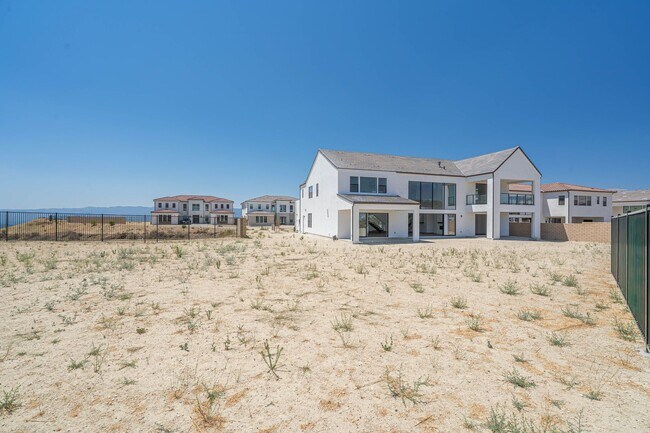Building Photo - Spacious 5-Bedroom Home with Community Ame...