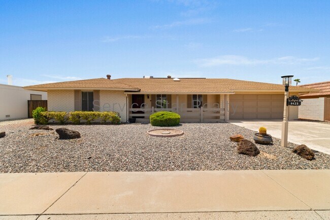 Building Photo - 9425 W Rolling Hills Dr