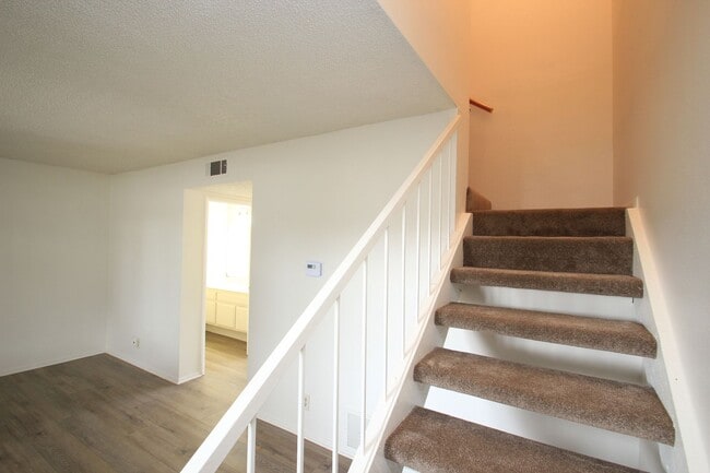 Building Photo - Coming Soon – Charming 3-Bedroom Townhome ...
