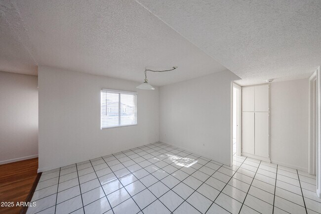 Building Photo - 3408 W Port Au Prince Ln