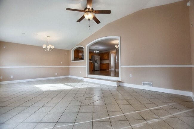 Building Photo - Pet Friendly Three Bedroom with Bonus!