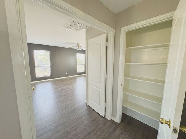 Building Photo - 4BR / 2.5BA Home with Expansive Lot – 2-Car Garage, Community Pools & Golf