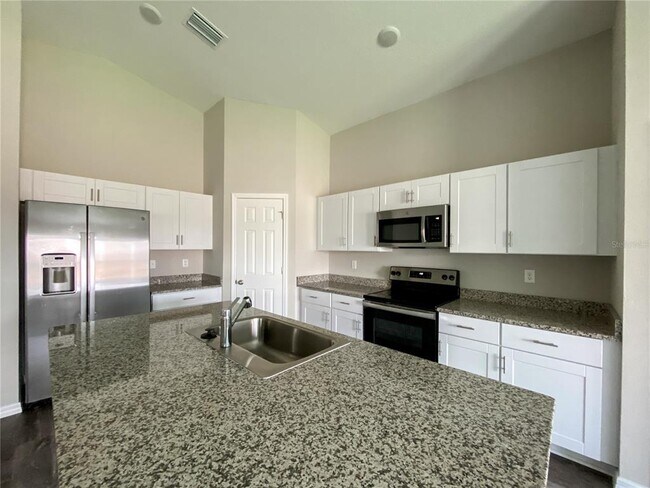 Building Photo - 12921 Twin Bridges Dr