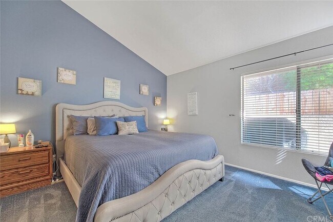 Large beautiful master bedroom overlooking patio with cathedral ceilings - 1073 S Romney Dr