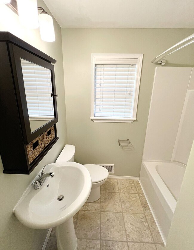 Building Photo - COMING SOON: Spacious Home with a Great Ya...