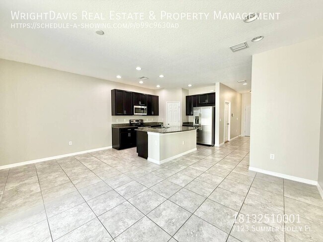 Building Photo - 7123 Summer Holly Pl