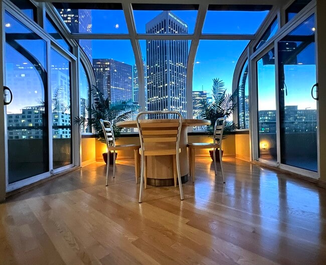 Nighttime view, two patios - 121 S Hope St