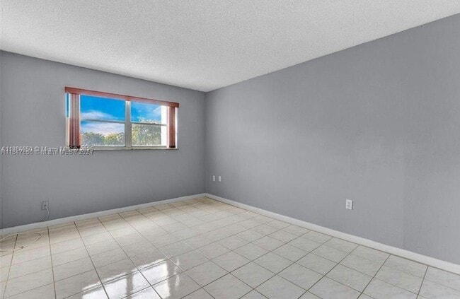 Building Photo - 8100 Sunrise Lakes Blvd