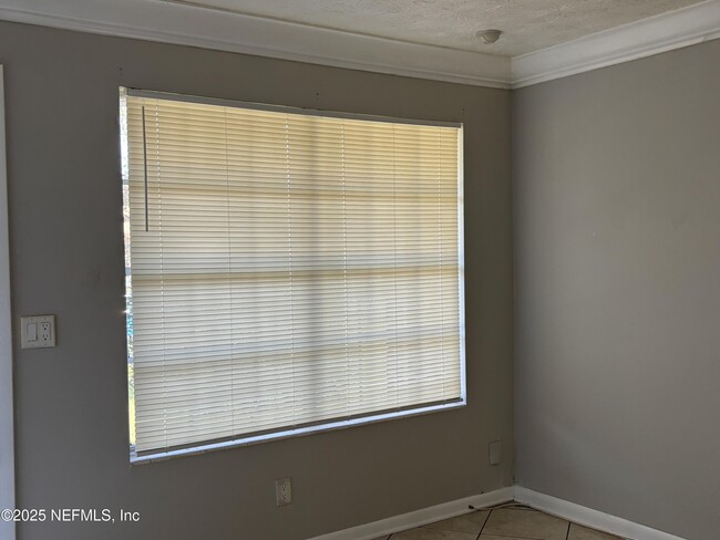 Building Photo - 7430 Jade Dr N