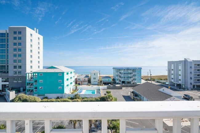 Building Photo - ENJOY OCEAN BREEZES FROM THIS FURNISHED OFF-SEASON OCEAN VIEW CONDO W/BALCONIES