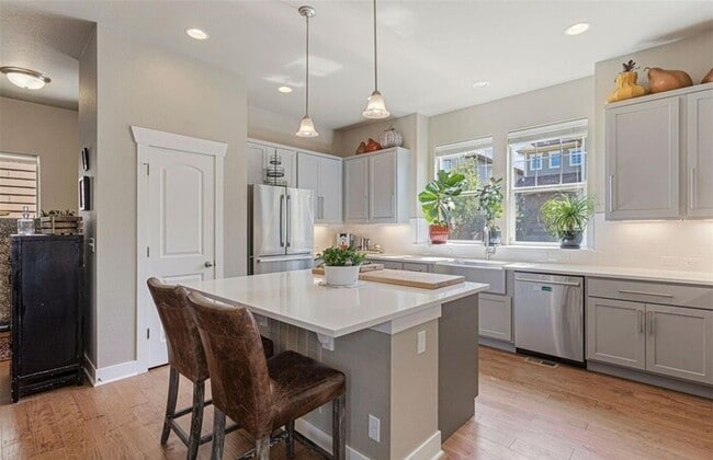 Building Photo - Modern 3BR Home with Finished Basement & Private Courtyard in Lowry